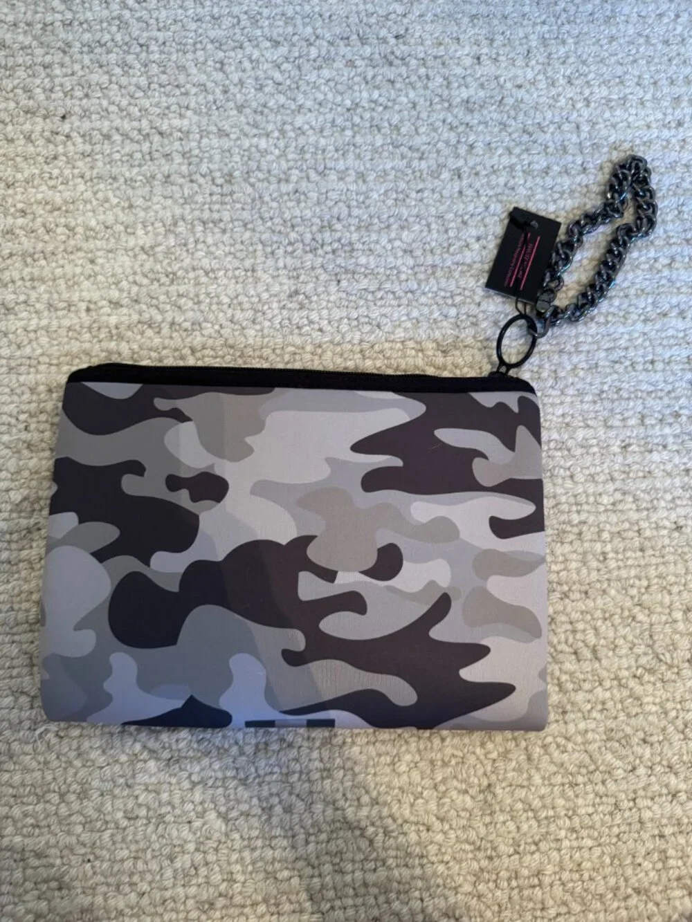 New with tags (NWT) Haute Shore Clutch/wristlet bag.
